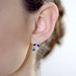 10k White Gold Genuine Sapphire and White Topaz Crescent Earrings