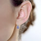 10k White Gold Genuine Pear-Shape Tanzanite and Diamond Curved Halo Drop Earrings
