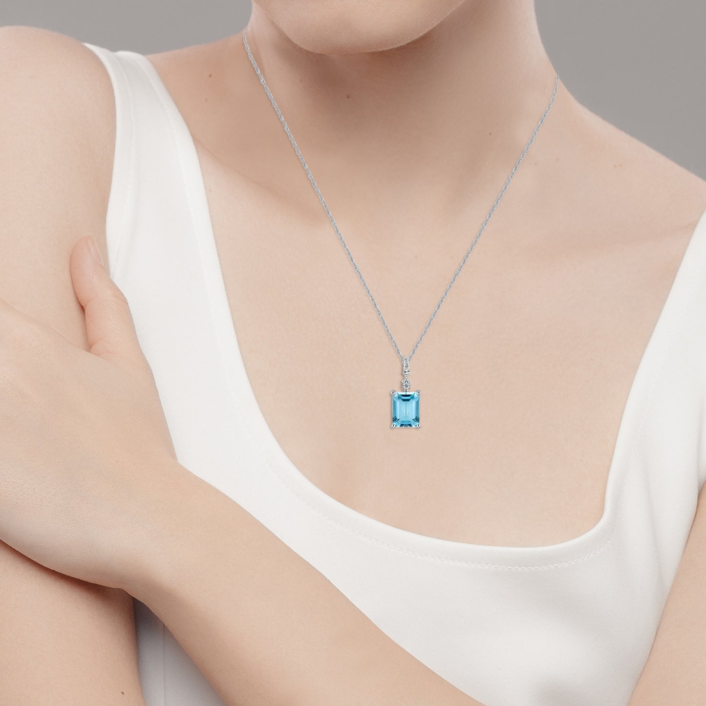 10k White Gold Genuine Emerald Cut Blue Topaz Pendant Necklace