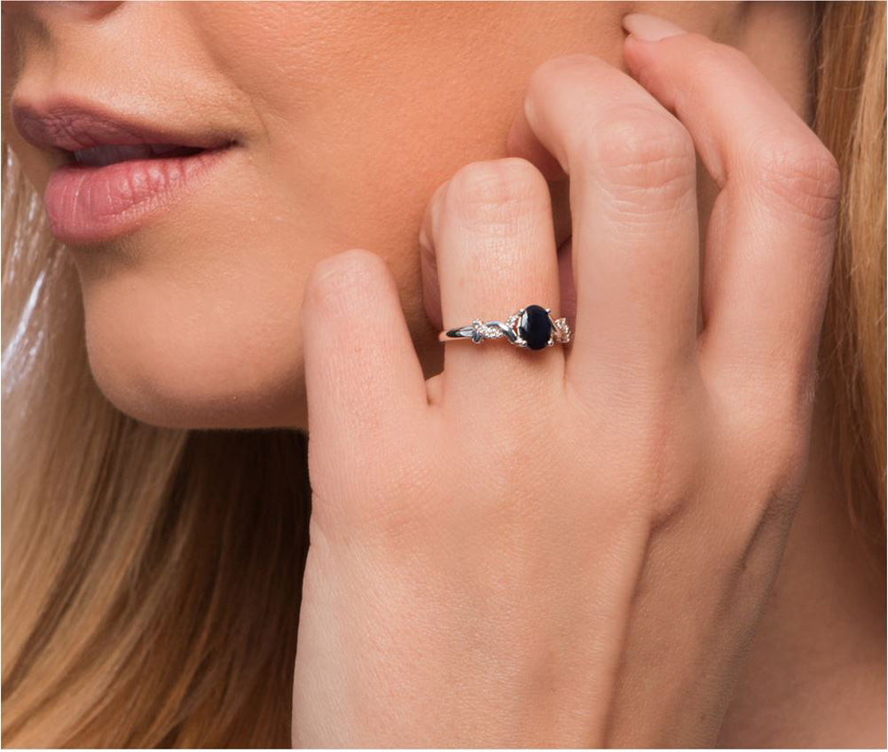 10k White Gold Oval Sapphire and Braided Diamond Accent Ring